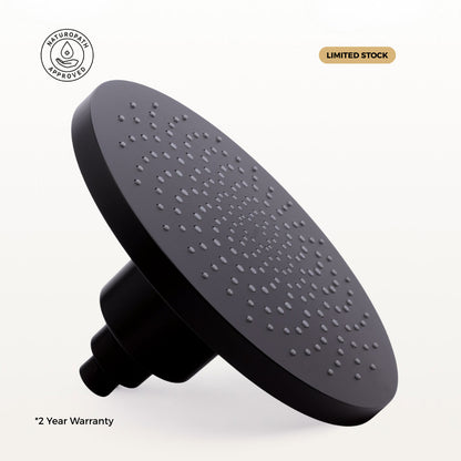 Black filtered shower head with 'Limited Stock' and '2 Year Warranty' text on a white background