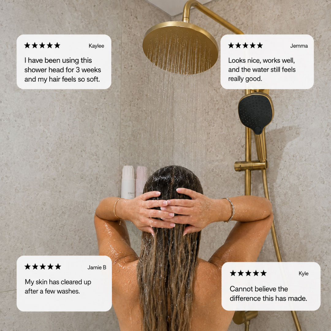 Person using a filtered shower head with customer reviews displayed.